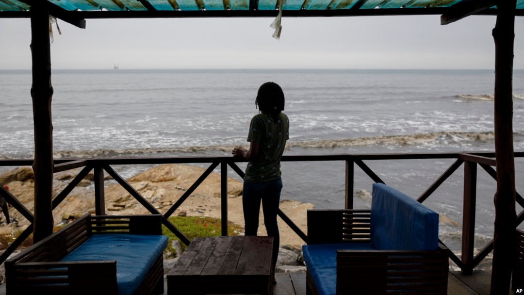 FILE - Efua, a 25-year-old fashion designer and single mother in Ghana who became pregnant in 2023, poses for a photo in Accra, Ghana, March 19, 2024.