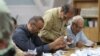 Iran election heads to runoff; turnout numbers in dispute