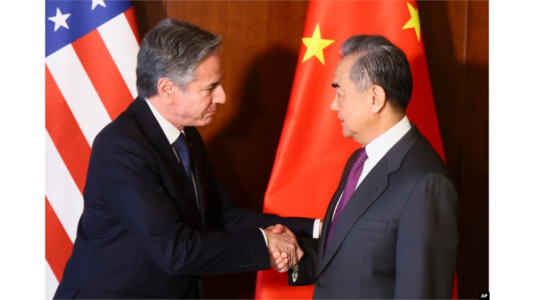U.S. Secretary of State Antony Blinken, left, and Chinese Foreign Minister Wang Yi shake hands during their meeting at the Munich Security Conference in Munich, Germany, Feb. 16, 2024.