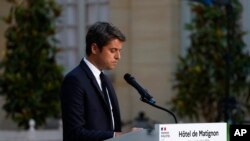 FILE - French Prime Minister Gabriel Attal delivers a speech after the second round of the legislative elections, July 7, 2024 in Paris. 