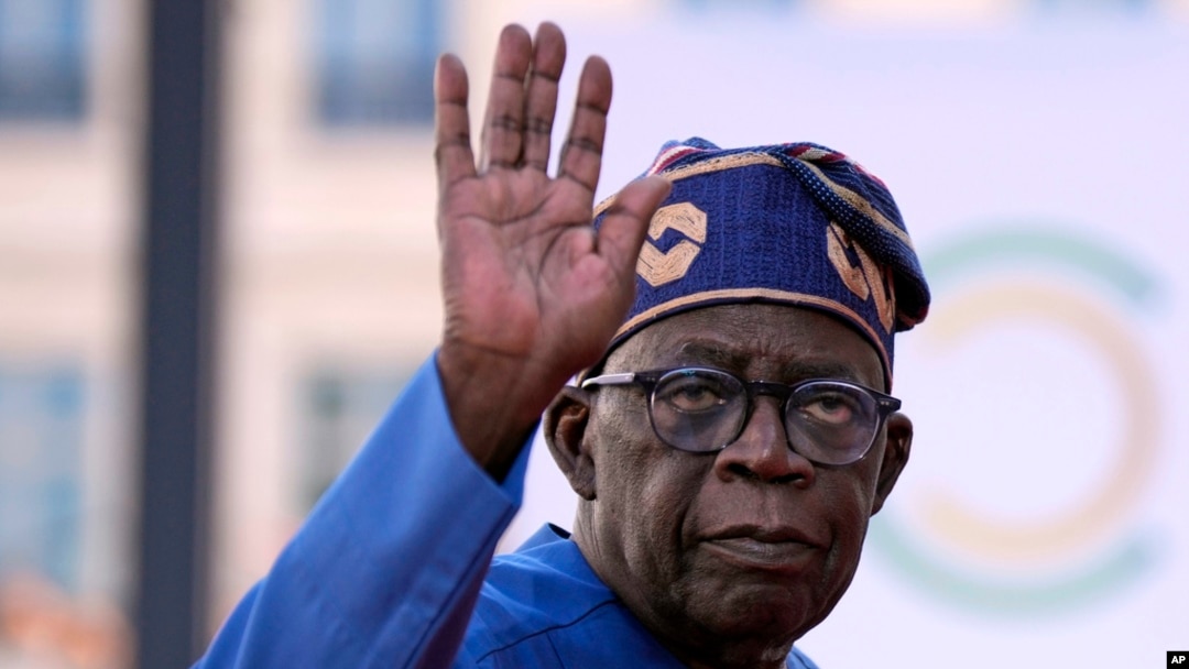 FILE - Nigeria's President Bola Tinubu arrives for the closing session of the New Global Financial Pact Summit, in Paris, on June 23, 2023.