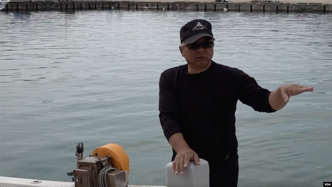 Fisherman Kotaro Kobari, seen here in March 2023, was at sea in August 2022 when a Chinese ballistic missile struck nearby. (W.Gallo/VOA)