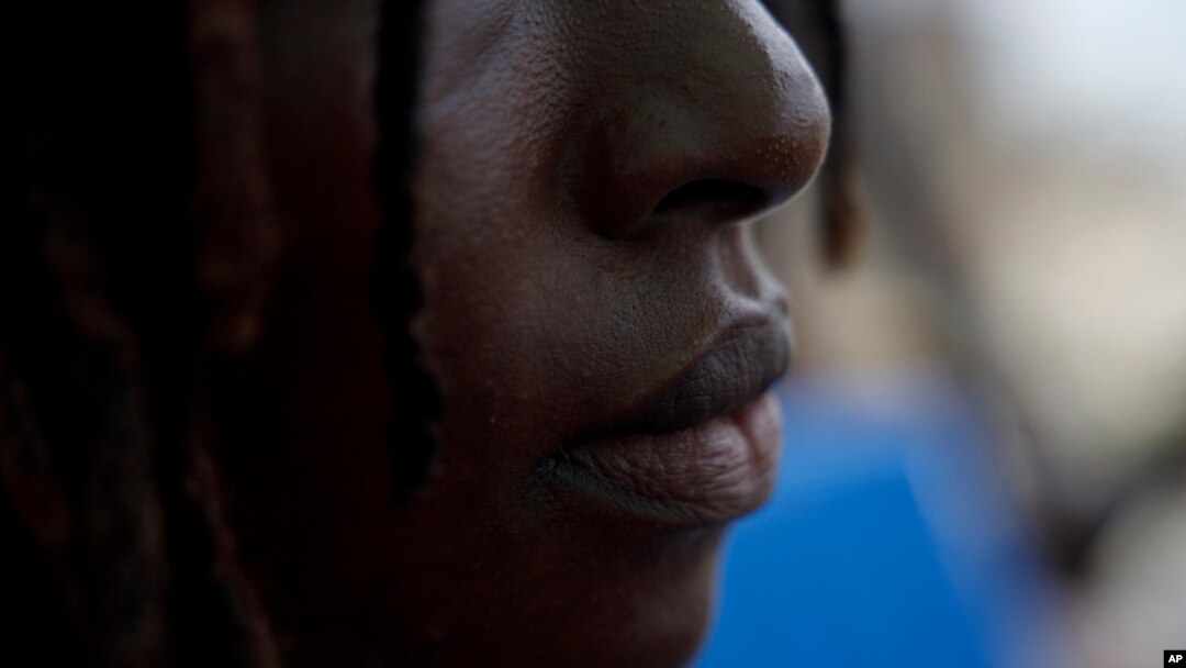 FILE - Efua, a 25-year-old fashion designer and single mother in Ghana who became pregnant in 2023, poses for a photo in Accra, Ghana, March 19, 2024. 