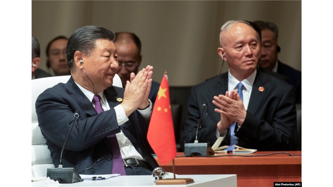 China's President Xi Jinping claps during the BRICS summit , in Johannesburg, South Africa, Wednesday, Aug. 23, 2023. (Alet Pretorius/Pool Photo via AP)
