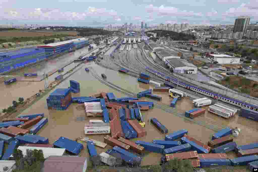 Containers are scattered next to a train station on the aftermath of floods caused by heavy rains in Istanbul, Turkey. Fierce rainstorms battered neighboring Greece, Turkey and Bulgaria, triggering flooding that caused at least seven deaths, including two holidaymakers swept away by a torrent that raged through a campsite in northwestern Turkey. 