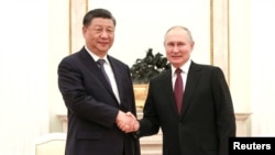 习近平与普京2023年3月20日在克里姆林宫会面。