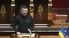Ukraine's President Volodymyr Zelenskyy delivers a speech at the National Assembly in Paris on June 7, 2024.