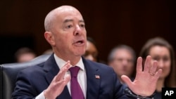 FILE - Homeland Security Secretary Alejandro Mayorkas testifies during a hearing on Capitol Hill, in Washington, Nov. 8, 2023.
