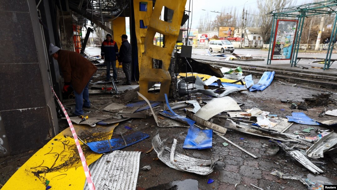 Wreckage lies on the ground at a bus station damaged after Russian shelling in Kherson, Ukraine, Feb. 21, 2023.