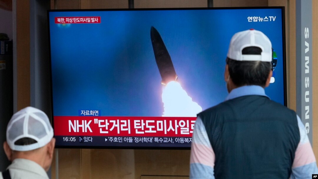 A TV screen shows a file image of North Korea's missile launch during a news program at the Seoul Railway Station in Seoul, South Korea, May 17, 2024. 