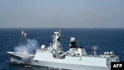 FILE - The Pakistan Navy Ship (PNS) Taimur, a Type 054A ship designed and built for Pakistan by China, fires rounds during a naval exercise in the Arabian Sea near Pakistan's port city of Karachi on Feb. 13, 2023.