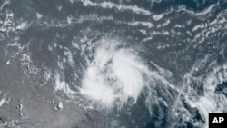 This GeoColor satellite image taken June 20, 2023 and provided by NOAA, shows Tropical Storm Bret as it chugged toward the eastern Caribbean.