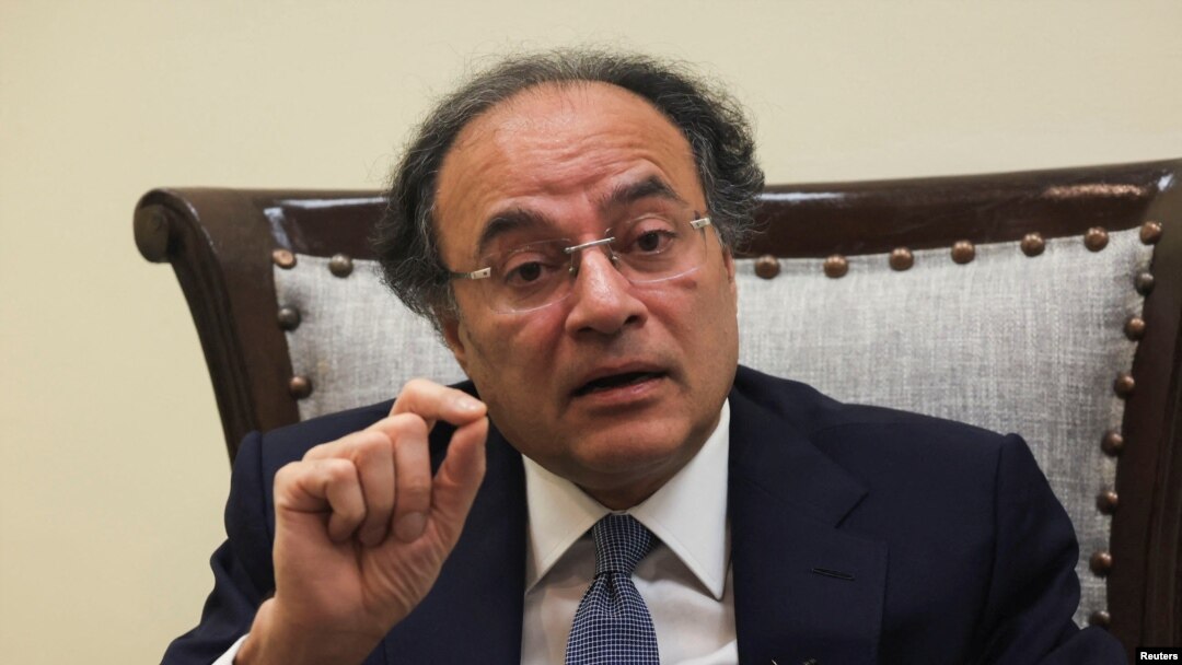 Pakistan Finance Minister Muhammad Aurangzeb speaks during an interview with Reuters at his office in Islamabad, July 19, 2024. Aurangzeb arrived in Beijing, July 25, 2024, for talks on power sector debt relief alongside structural reforms suggested by the IMF.