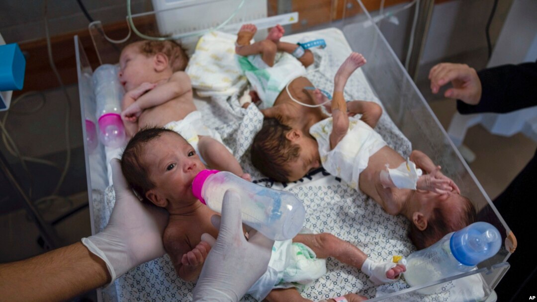 FILE - Medics prepare premature babies for transport to Egypt after they were evacuated from Al Shifa hospital in Gaza City to a hospital in Rafah, Gaza Strip, Nov. 20, 2023.