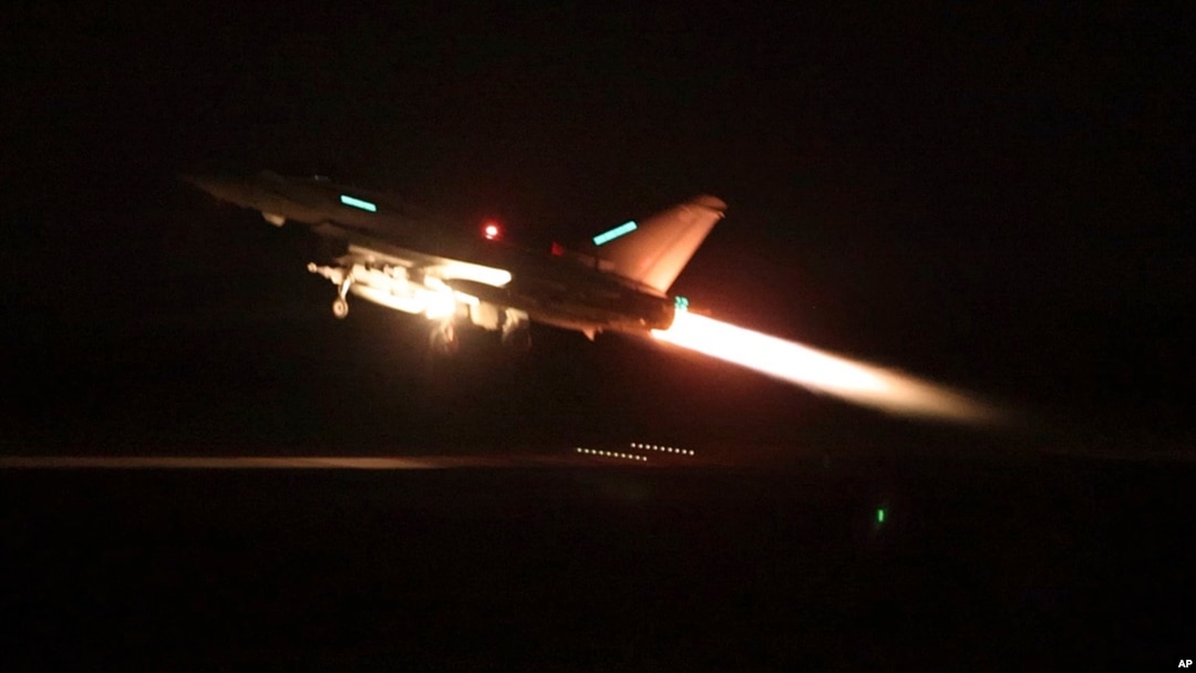 This image provided by the UK Ministry of Defense taken Jan. 11, 2024, shows an RAF Typhoon aircraft taking off from RAF Akrotiri in Cyprus, for a mission to strike targets in Yemen. 