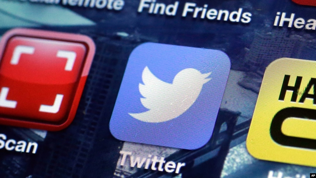 FILE - A Twitter app on an iPhone screen is shown.