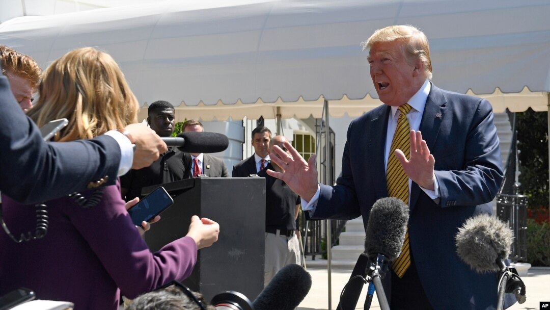 President Donald Trump speaks to reporters on the South Lawn of the White House in Washington, June 22, 2019, before boarding Marine One for the trip to Camp David in Maryland. 