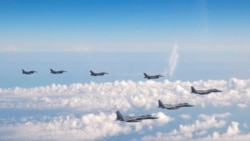 美日戰鬥機在日本海上空展翅聯飛 被指直接回應中俄轟炸機聯合戰略巡航
