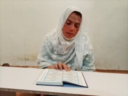 Rani Khan, a transgender woman who teaches the Koran, reads the Koran at Pakistan's first transgender only madrasa or a religious school, in Islamabad, Pakistan February 25, 2021. Picture taken February 25, 2021. REUTERS/Salahuddin NO RESALES. NO ARCHIVES