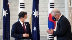 南韓總統文在寅2021年12月13日訪問堪培拉時受到澳大利亞總理莫里森的接待（路透社）