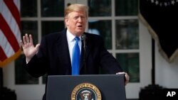 El presidente Donald Trump habló durante un evento en el Jardín de las Ross, en la Casa Blanca, para declarar una emergencia nacional con el fin de construir un muro a lo largo de la frontera con México, el 15 de febrero de 2019, en Washington.