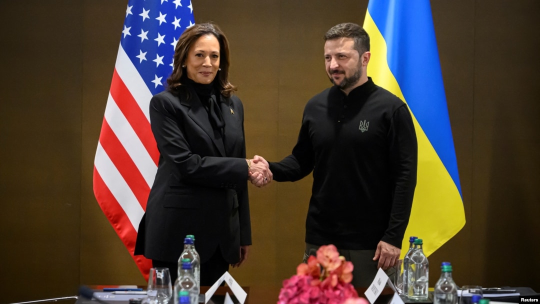 FILE - U.S. Vice President Kamala Harris, left, shakes hands with President Volodymyr Zelenskyy of Ukraine as they meet during the Ukraine peace summit, in Stansstad near Lucerne, Switzerland, June 15, 2024.