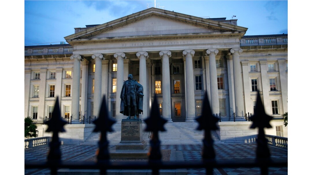 The U.S. Treasury Department building at dusk, June 6, 2019, in Washington.