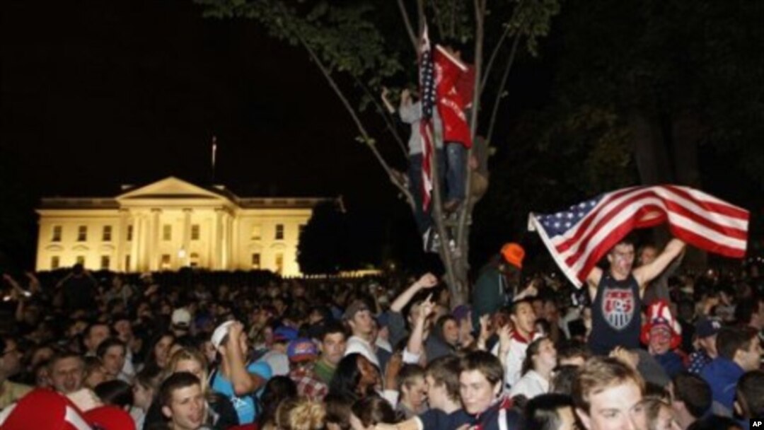 Crowds gathers outside the White House in Washington early Moday to celebrate after President Barack Obama announced the death of Osama bin Laden, May 2, 2011