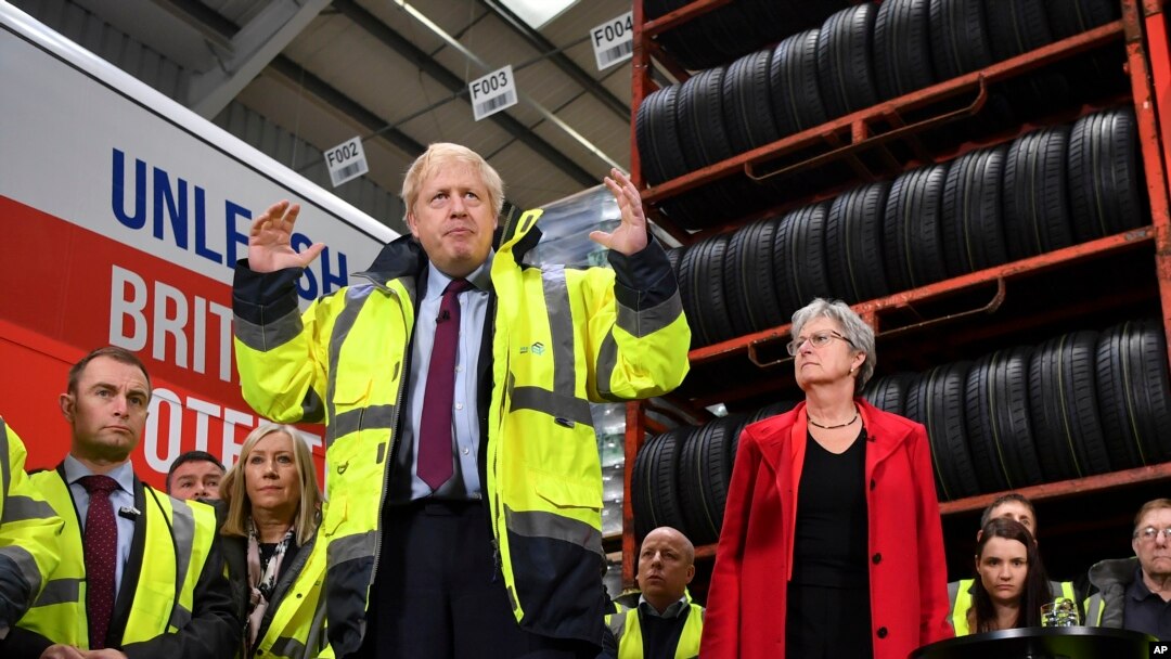 Britain's Prime Minister Boris Johnson talks during a question and answer session, part of a General Election campaign visit to Ferguson's Transport in Washington, England, Dec. 9, 2019. 