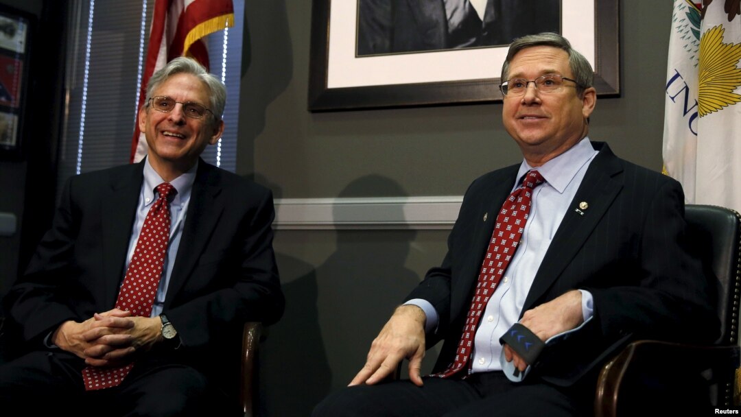 Republican Senator Mark Kirk meets with President Barack Obama's Supreme Court nominee Merrick Garland (L), on Capitol Hill in Washington, March 29, 2016.