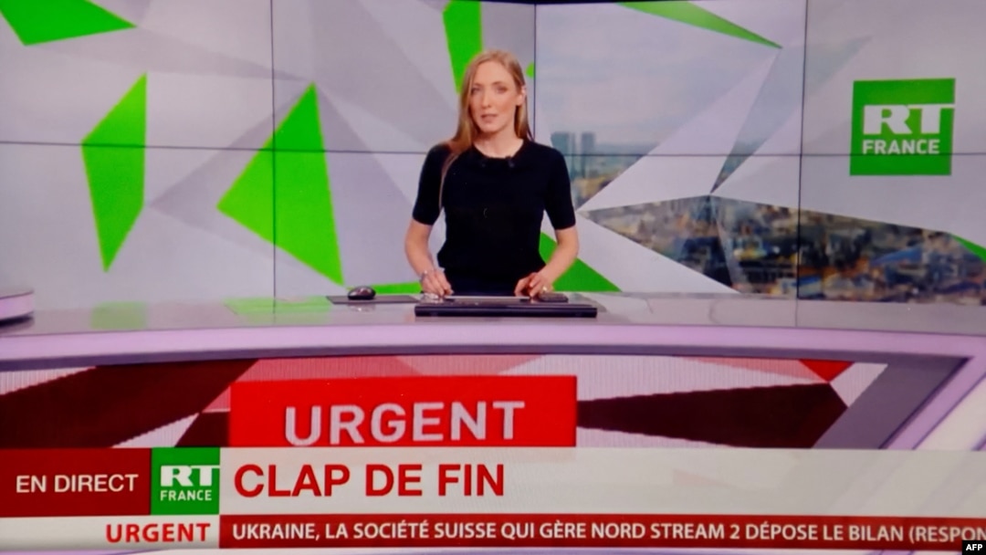 FILE - This file photo taken in Paris on March 2, 2022 shows RT France network last live emission due to a European Union decision after the Russia's invasion of Ukraine. 