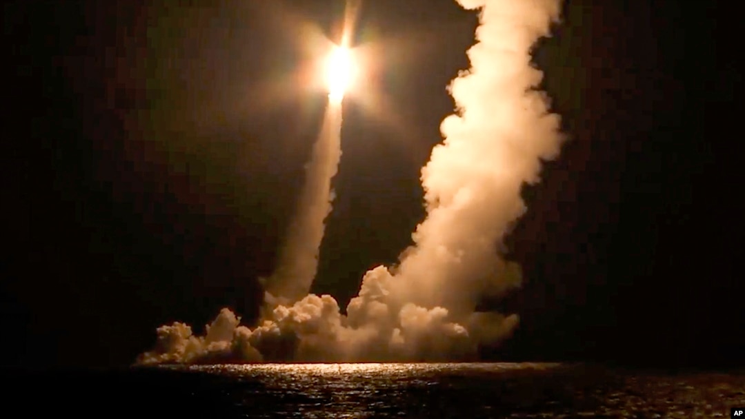 FILE - In this photo taken from video distributed by Russian Defense Ministry Press Service, Intercontinental ballistic missiles are launched by the Vladimir Monomakh nuclear submarine of the Russian navy from the Sera of Okhotsk, Russia, on Dec. 12, 2020.