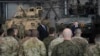 U.S. Defense Secretary Lloyd Austin addressesww U.S. troops stationed at the Powidz Air Base, in Poland, on Feb. 18, 2022