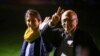 Nazanin Zaghari-Ratcliffe, left, and Anoosheh Ashoori, who were freed from Iran, wave after landing at RAF Brize Norton in Brize Norton, England, March 17, 2022. 