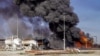 A handout picture released by Syria's General Organization of Radio and Television Telegram channel on Nov. 23, 2022, shows a fire at an unspecified hydrocarbon facility reportedly following a Turkish airstrike near Tal Awdah in northeastern Syria's Hasakah province.