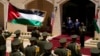 Palestinian President Mahmoud Abbas and US President Joe Biden stand in front of the honor guard in the West Bank town of Bethlehem, July 15, 2022. 