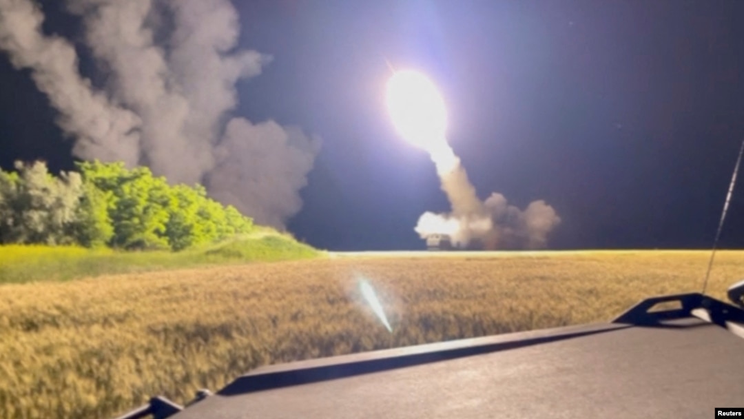 FILE - A High Mobility Artillery Rocket System (HIMARS) is fired at an undisclosed location in Ukraine in this still image obtained from an undated social media video uploaded on June 24, 2022.