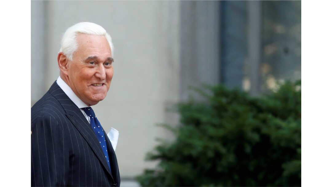 FILE - Roger Stone, former campaign adviser to U.S. President Donald Trump, arrives for the continuation of his trial on charges of lying to Congress, obstructing justice and witness tampering, at U.S. District Court in Washington, Nov. 15, 2019.