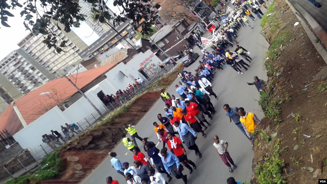 Members of the Seventh Day Adventist Church march for four hours in the crime-infested Johannesburg suburbs of Hilbrow, Berea and Yeoville, Sept. 6, 2015. (photo by Thuso Khumalo)