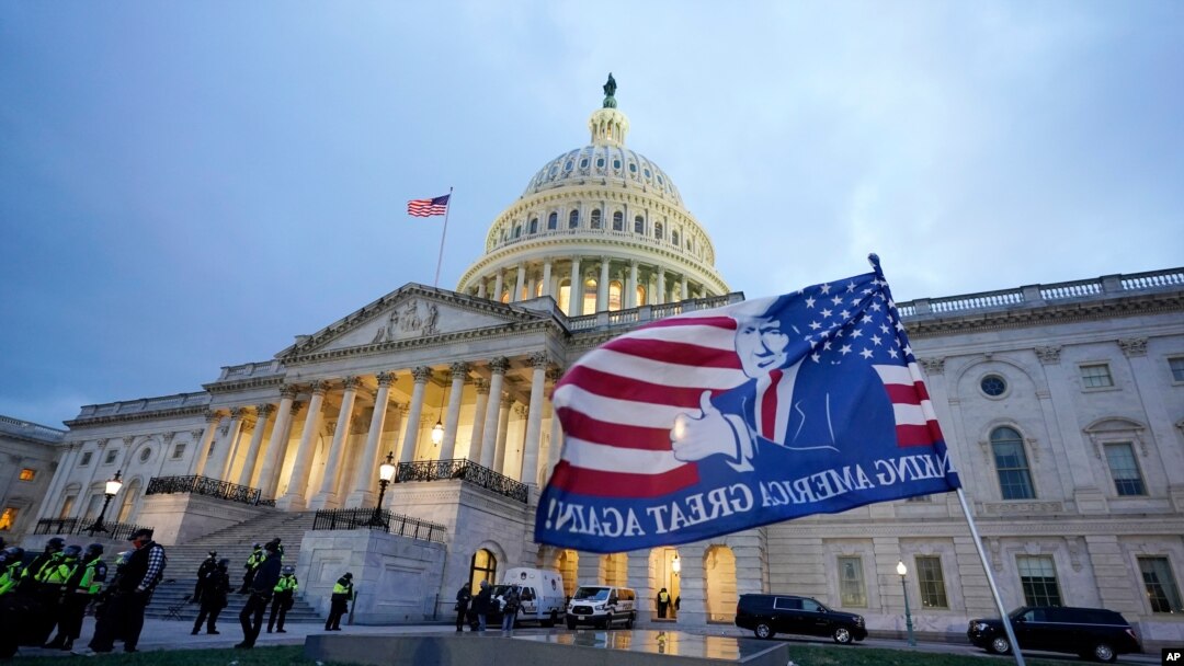 Trump supporters left a flag outside the Capitol, Jan. 6, 2021, in Washington.