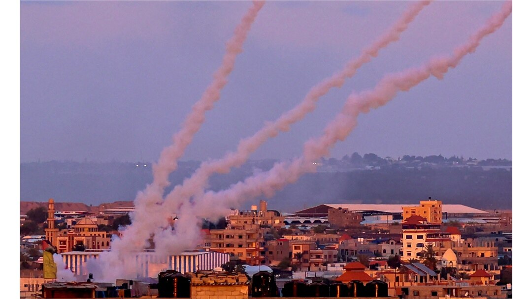 Rockets are launched toward Israel from the southern Gaza Strip, May 17, 2021.