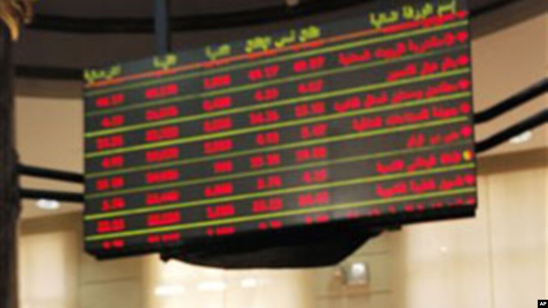 A trader works during Egypt's stock exchange reopening session after a nearly two-month closure, in Cairo, March 23, 2011