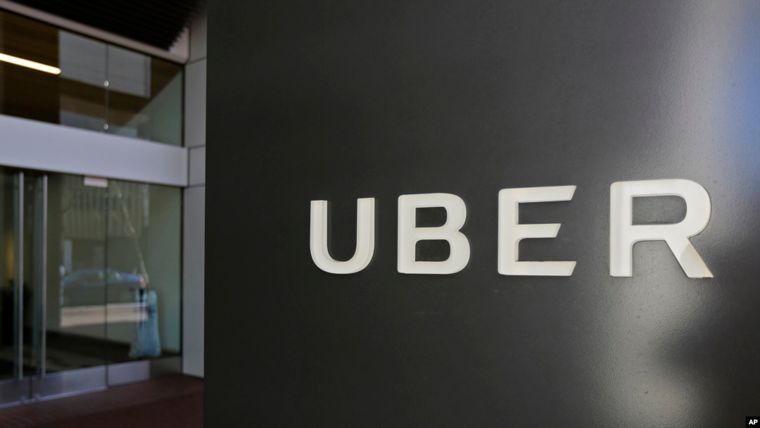 FILE - An exterior view of the headquarters of Uber is seen in San Francisco, March 1, 2017. Toyota will sink a half-billion dollars into Uber and work jointly with the ride-hailing giant to develop self-driving vehicles. 