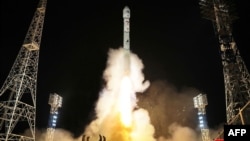 资料图片：朝鲜官媒发布照片显示2023年11月21日发射侦查卫星。(AFP PHOTO/KCNA VIA KNS)