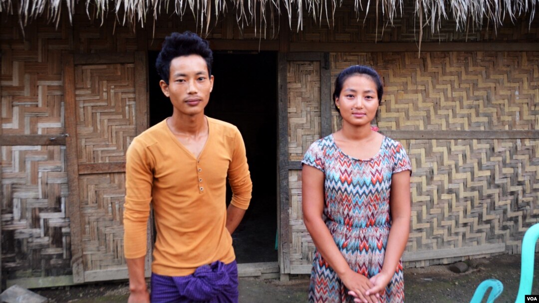 La Moi, 25, and Kaw Nan, 28, whose father was jailed for resisting a land grab near Myitkyina, Kachin State. (P. Vrieze for VOA)