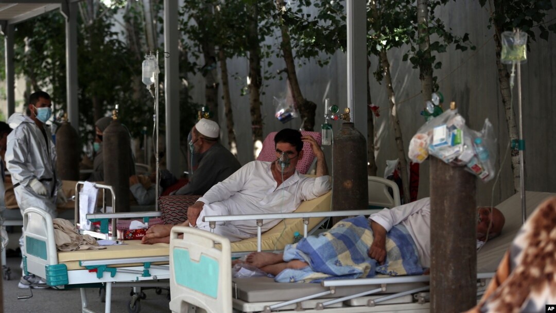 Patients are connected to oxygen tanks at the Afghan-Japan Communicable Disease Hospital, for COVID-19 patients in Kabul, Afghanistan, June 18, 2020.
