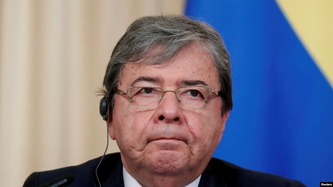 ARCHIVO - Carlos Holmes Trujillo asiste a una conferencia de prensa en Moscú, Rusia, el 3 de junio de 2019.