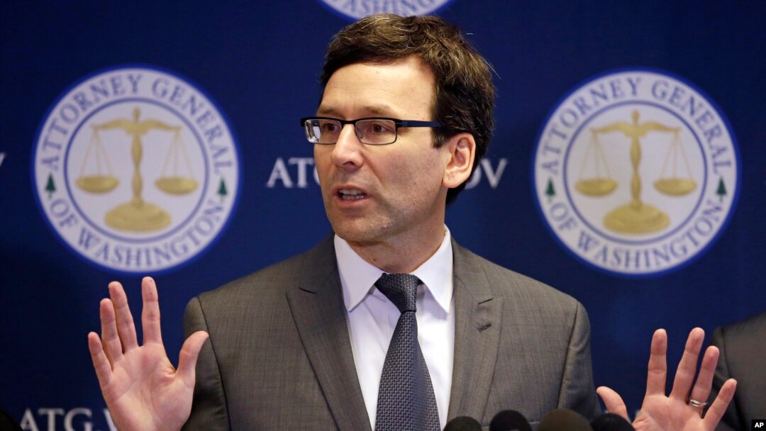 Washington State Attorney General Bob Ferguson speaks at a news conference about the state's response to President Trump's revised travel ban Thursday, March 9, 2017, in Seattle. 