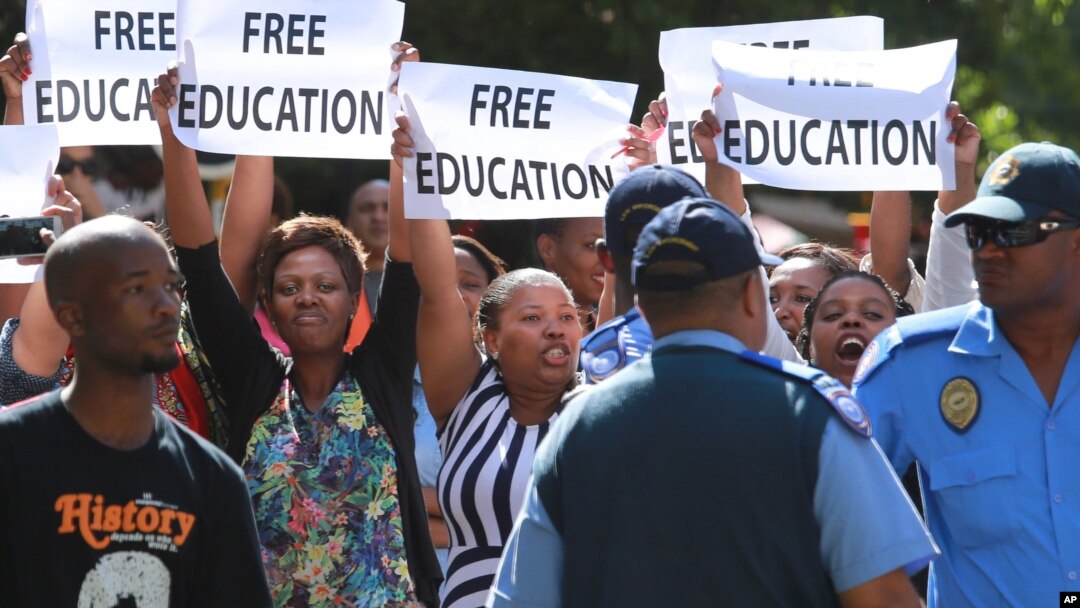 FILE - Protesting university students demand free education during a rally in Cape Town, South Africa, Oct. 22, 2015.