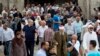 FILE - Palestinian Muslim worshippers walk in Jerusalem's Old City after Friday prayers, Oct. 23, 2015.